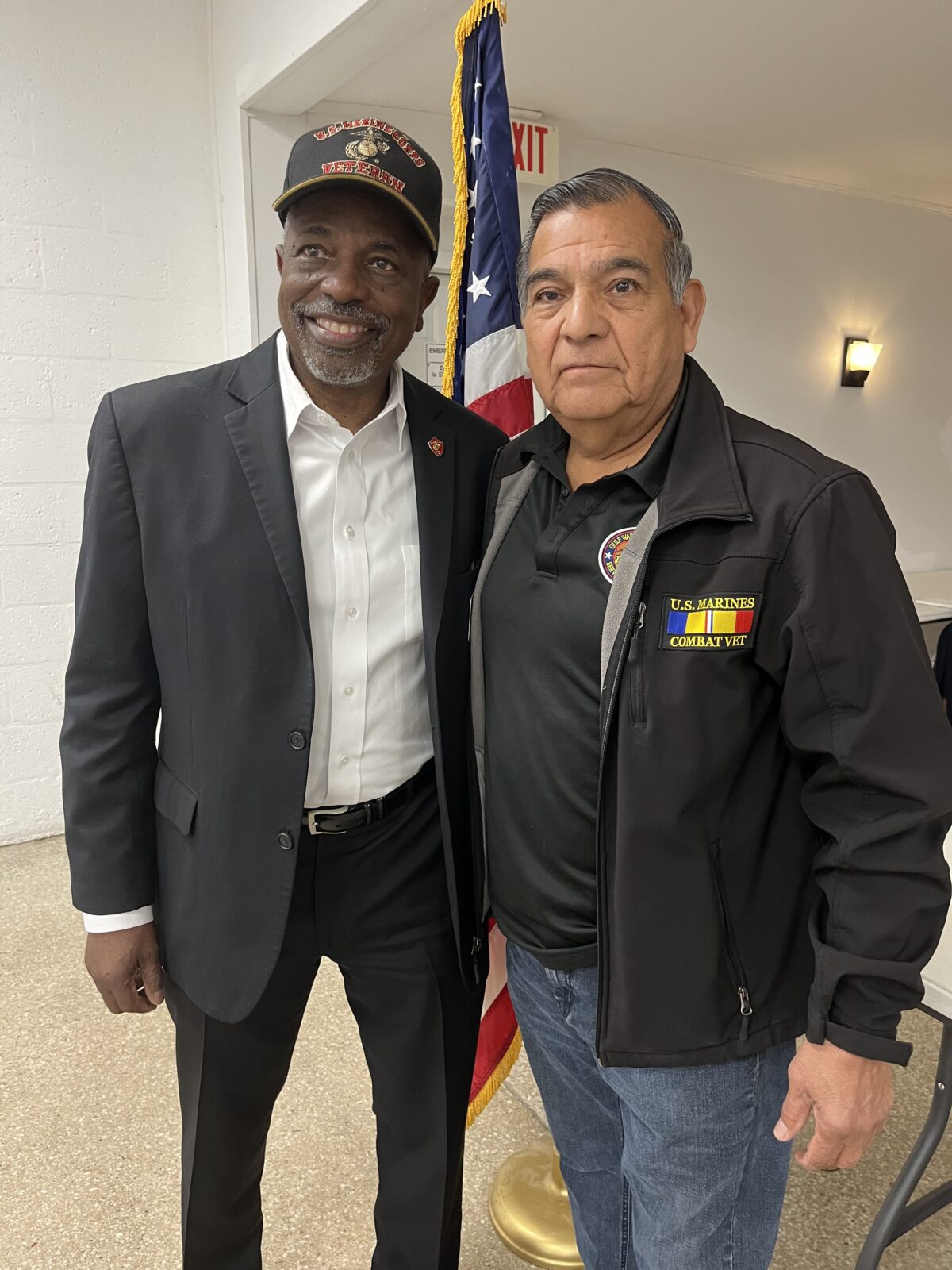 Two veterans posing for the camera